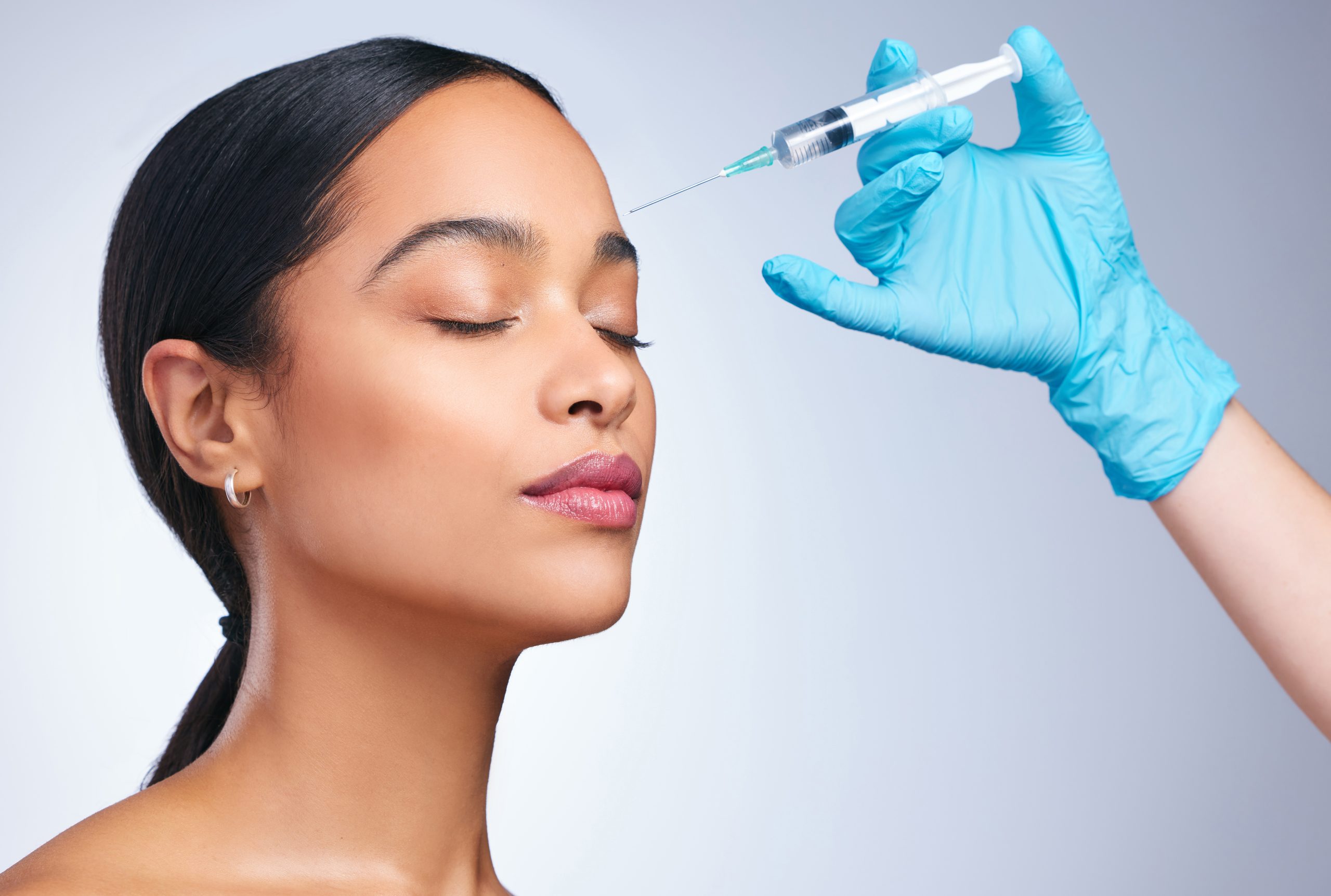 A women receives a injection of quality dermal fillers