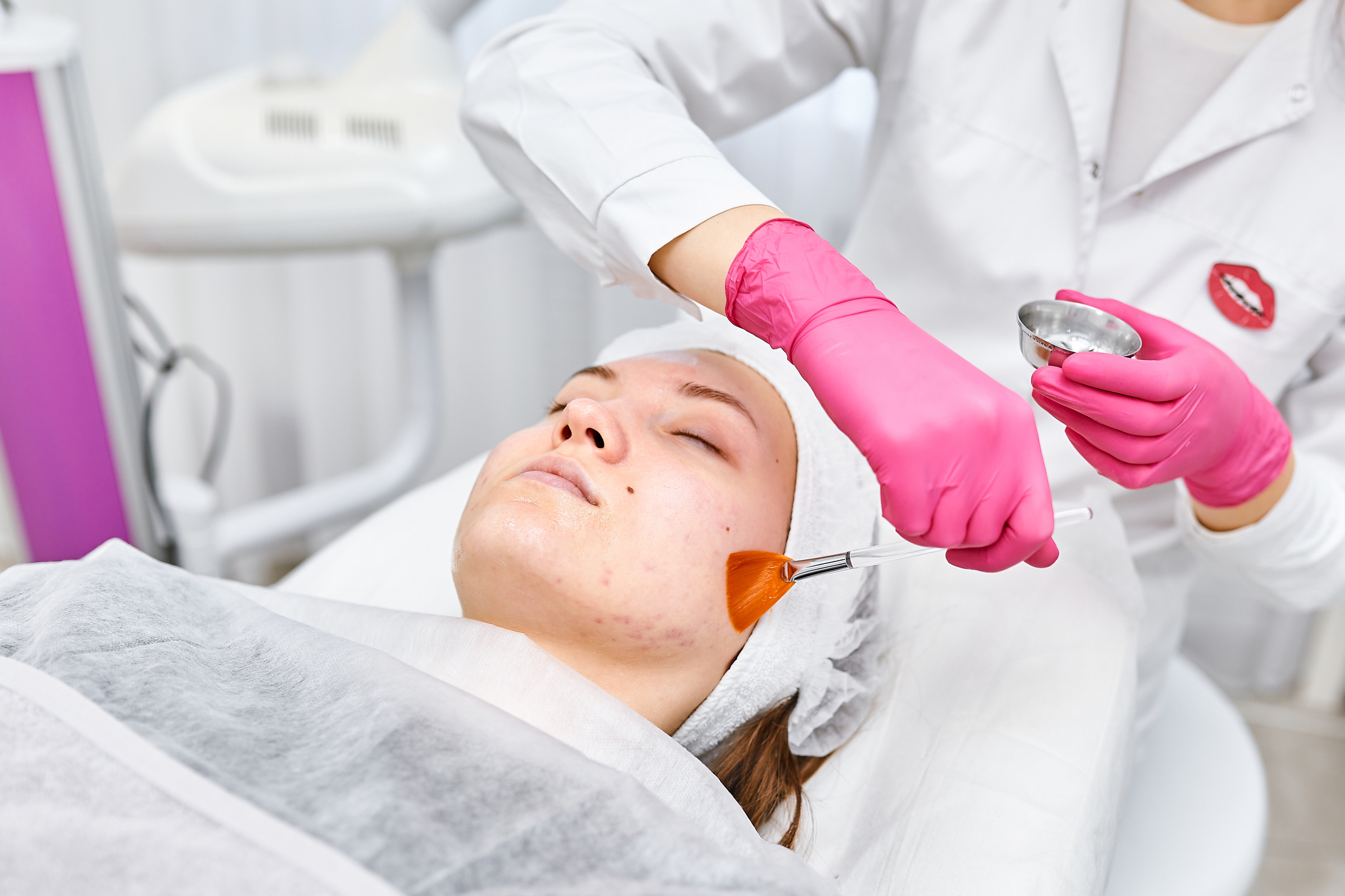 A woman gets a chemical peel facial in Calgary at a medi spa