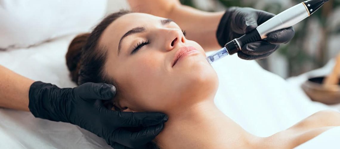 Salmon Sperm PDRN applied to woman's face using microneedling skin rejuvenation technique